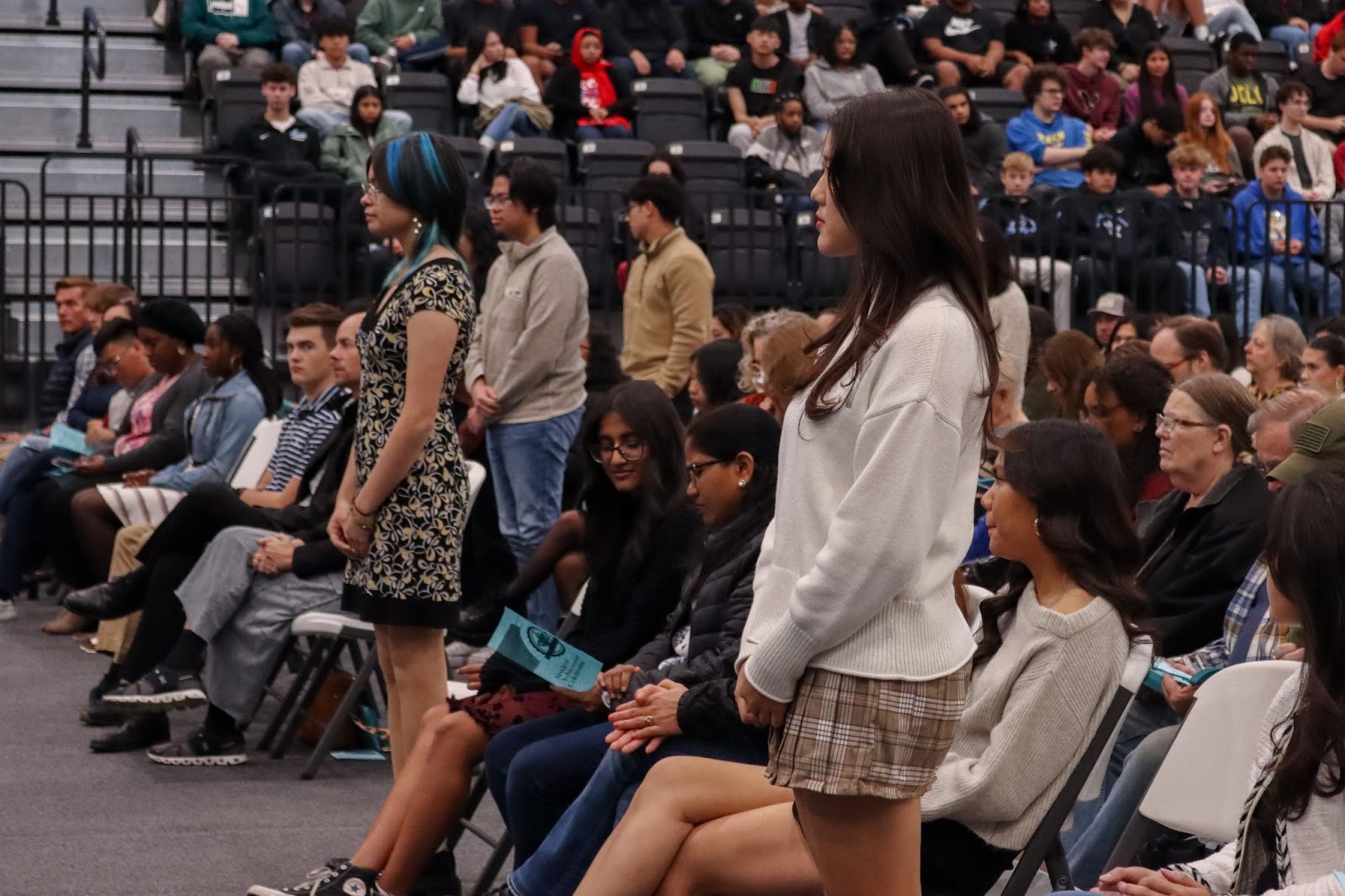 students standing during assembly